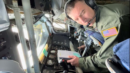 U.S. Air Force Tech. Sgt. Michael Randolph, a boom operator with the 914th Air Refueling Wing, checks his instruments before refueling a Norwegian F-35 Lightning II from aKC-135 Stratotanker over the High North during Nordic Response 24,March 8, 2024.