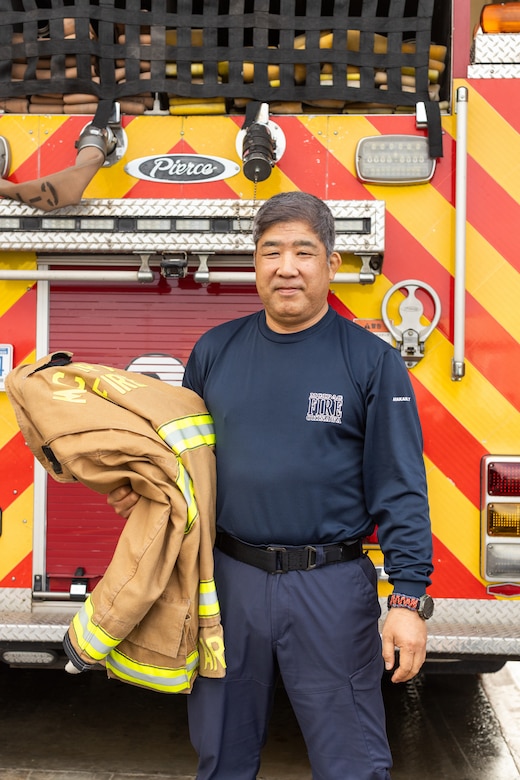 Yoshikazu Arakaki, a fire captain with Marine Corps Installations Pacific Fire and Emergency Services, poses for a portrait on Camp Hansen, Okinawa, Japan, March 5, 2024. Born and raised in Kadena, Okinawa, Japan, Arakaki has been a firefighter for 30 years. Arakaki’s duties as a fire captain include ensuring the personal safety of his team, spearheading daily training, inspections, emergency preparation, supply management, and coordinating his team’s schedules. (U.S. Marine Corps photo by Lance Cpl. Brody Robertson)
