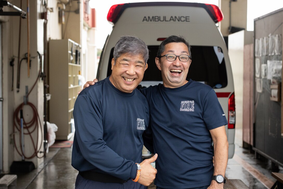 Yoshikazu Arakaki and Dai Sunagawa, fire captains with Marine Corps Installations Pacific Fire and Emergency Services, pose for a portrait on Camp Hansen, Okinawa, Japan, March 5, 2024. Born and raised in Kadena, Okinawa, Japan, Arakaki has been a firefighter for 30 years. Arakaki’s duties as a fire captain include ensuring the personal safety of his team, spearheading daily training, inspections, emergency preparation, supply management, and coordinating his team’s schedules. (U.S. Marine Corps photo by Lance Cpl. Brody Robertson)