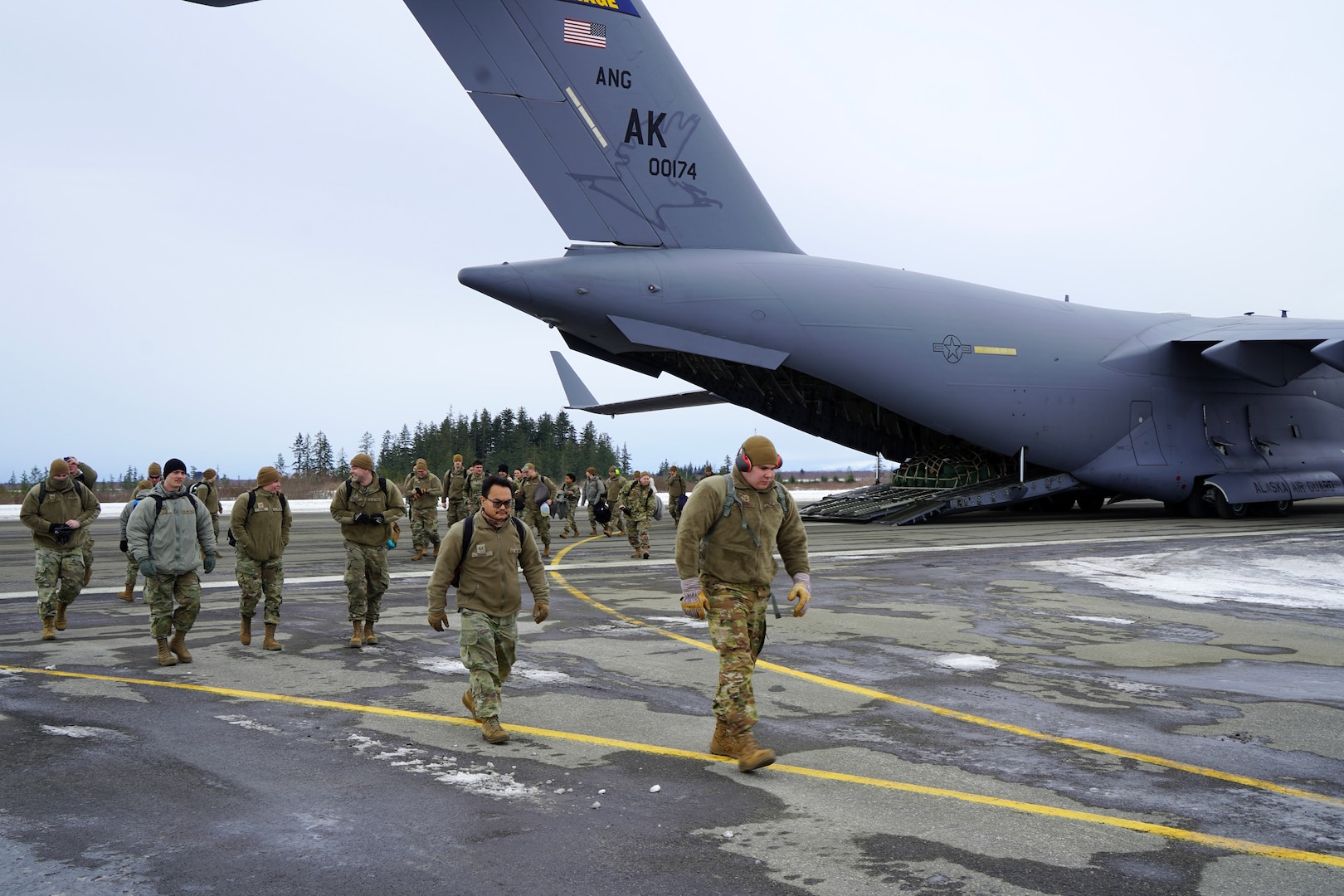Alaska and Maine National Guardsmen offload from a 176th Wing C-17 Globemaster III while supporting Exercise Vigilant Guard 2024-2 (Alaska) at Merle K. “Mudhole” Smith Airport, Cordova, Alaska, March 5, 2024.