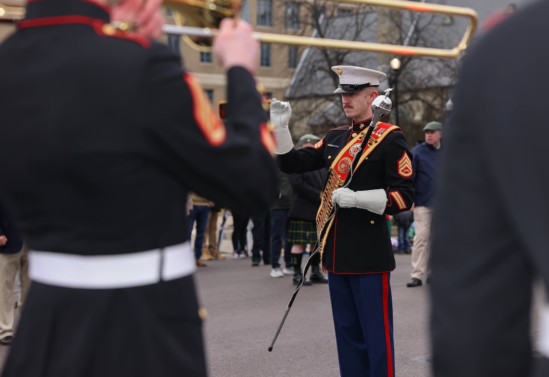 U.S. Marines with the Quantico Marine Band march during the St. Patricks’ Day Parade in Scranton, Pennsylvania, March 9, 2024. The band provides musical support that enhances community relations and troop morale, and promotes the Marine Corps recruiting program through events such as parades, concerts, and ceremonies. (U.S. Marine Corps photo by Lance Cpl. David Brandes)