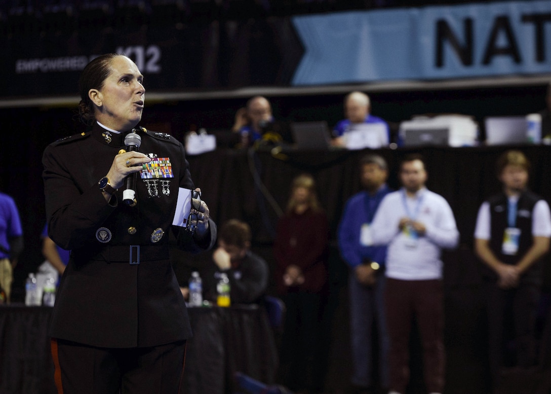 U.S. Marine Corps Major General Roberta L. Shea, Legislative Assistant to the Commandant of the Marine Corps, Office of Legislative Affairs, Headquarters Marine Corps, speaks at the National Collegiate Women’s Wrestling Championships, Cedar Rapids, IA., March 8, 2024. The National Collegiate Women’s Wrestling Championship works with Wrestle Like A Girl to promote female empowerment through the sport of wrestling. (U.S. Marine Corps photo by Cpl. Collette Hagen)