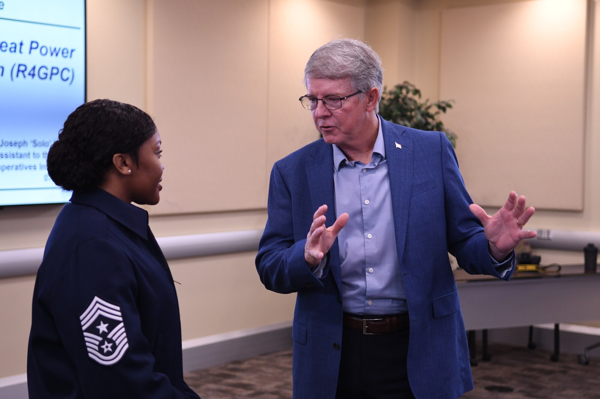 Retired Chief Master Sgt. of the Air Force Rodney J. McKinley discusses forthcoming events with Chief Master Sgt. Charmaine Kelly, Command Chief of the Air Force District of Washington at Joint Base Andrews, Md., March 7, 2024.