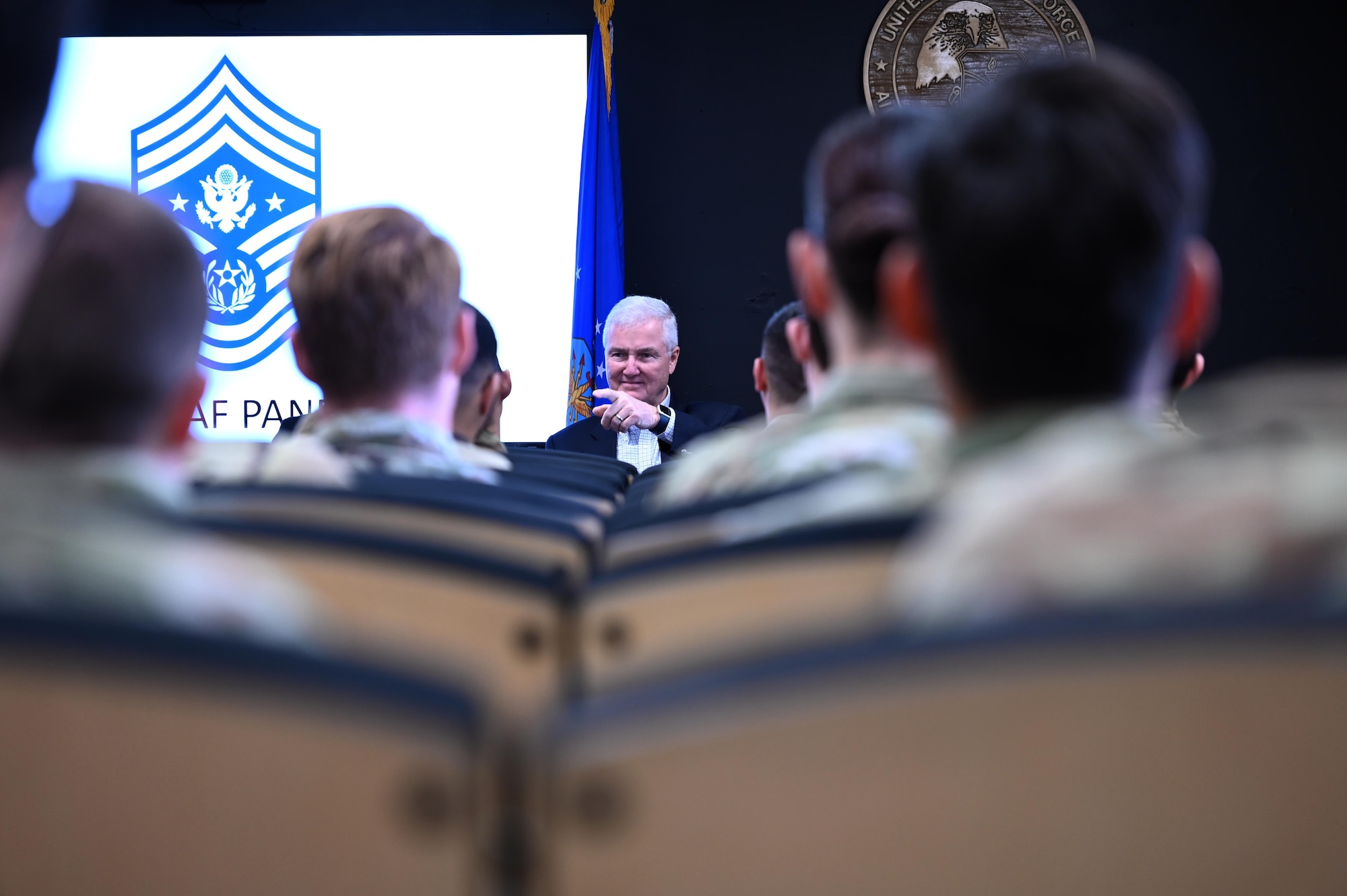 Former Chief Master Sgt. of the Air Force Gerald Murray selects a student of the Airmen Leadership School to ask a question during a panel discussion at Joint Base Andrews, Md., March 7, 2024.
