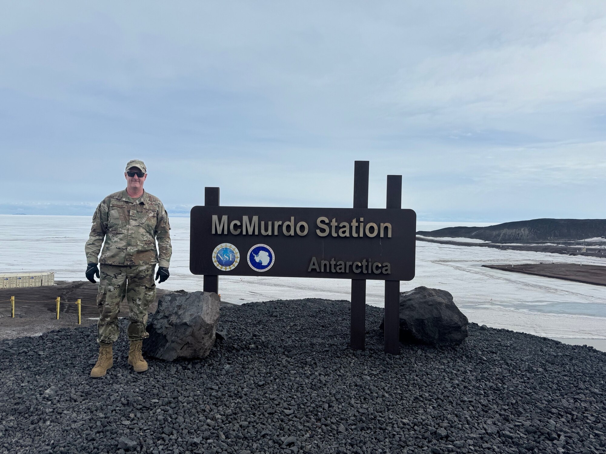 Senior Master Sgt. Jeff Reynolds, 142nd Wing Weapons Safety Manager, poses for a photo at McMurdo Station, Antarctica in December 2023. Reynolds served in a safety manager role there from December to January supporting Operation Deep Freeze, a joint Department of Defense mission to resupply the station in support of the National Science Foundation's research. (Courtesy photo)