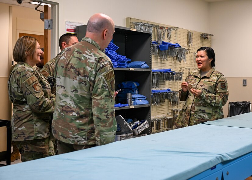 Tech. Sgt. Hilda Mata-Betancourt, 383rd Training Squadron surgical technology course instructor, guides leadership from the 59th Medical Wing through various classrooms, showcasing commonly used equipment by technical training students at the 59th Training Group, Joint Base San Antonio-Fort Sam Houston, Texas, March 1, 2024. The training group graduates over 14,500 students annually through the delivery of more than 165 formal courses and symposiums. (U.S. Air Force photo by Senior Airman Melody Bordeaux)