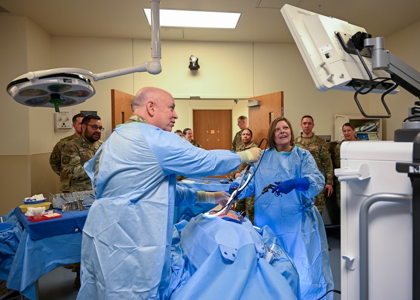 After donning the appropriate personal protective equipment, leadership from the 59th Medical Wing participate in an extraction procedure training technical students receive at the 59th Training Group, Joint Base San Antonio-Fort Sam Houston, Texas, March 1, 2024. The training group provides a full spectrum of healthcare education offering a continuum of learning, competency-based training, and credentialing within a tri-service environment.  (U.S. Air Force photo by Senior Airman Melody Bordeaux)