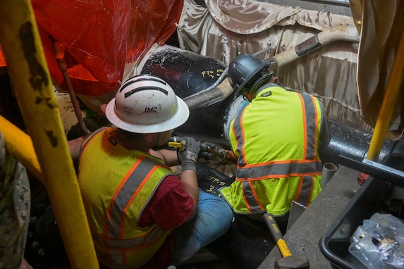 Personnel in support of Joint Task Force-Red Hill (JTF-RH) cut into a pipeline at the Red Hill Bulk Fuel Storage Facility (RHBFSF), Halawa, Hawaii, March 12, 2024.