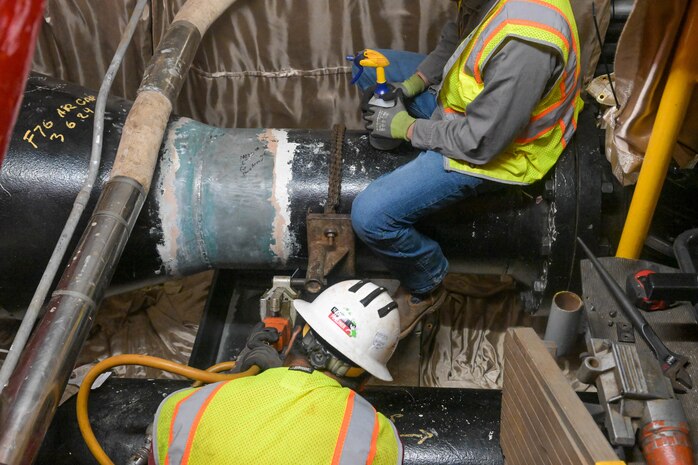 Personnel in support of Joint Task Force-Red Hill (JTF-RH) cut into a pipeline at the Red Hill Bulk Fuel Storage Facility (RHBFSF), Halawa, Hawaii, March 12, 2024.