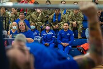 Attendees watch as a member of the U.S. Air Force team competes in the 2024 Air Force and Marine Corps powerlifting competition at Nellis Air Force Base, Nevada, March 8, 2024.