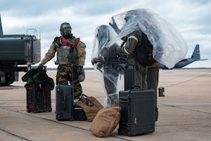 Airmen assigned to the 317th Airlift Wing practice CBRN protocol during the Hazard Dawn readiness exercise at Dyess Air Force Base Texas, Feb. 29, 2024. The squadrons were evaluated on their mission essential tasks, allowing them to train on tasks they were unfamiliar with. (U.S. Air Force photo by Airman 1st Class Emma Anderson)