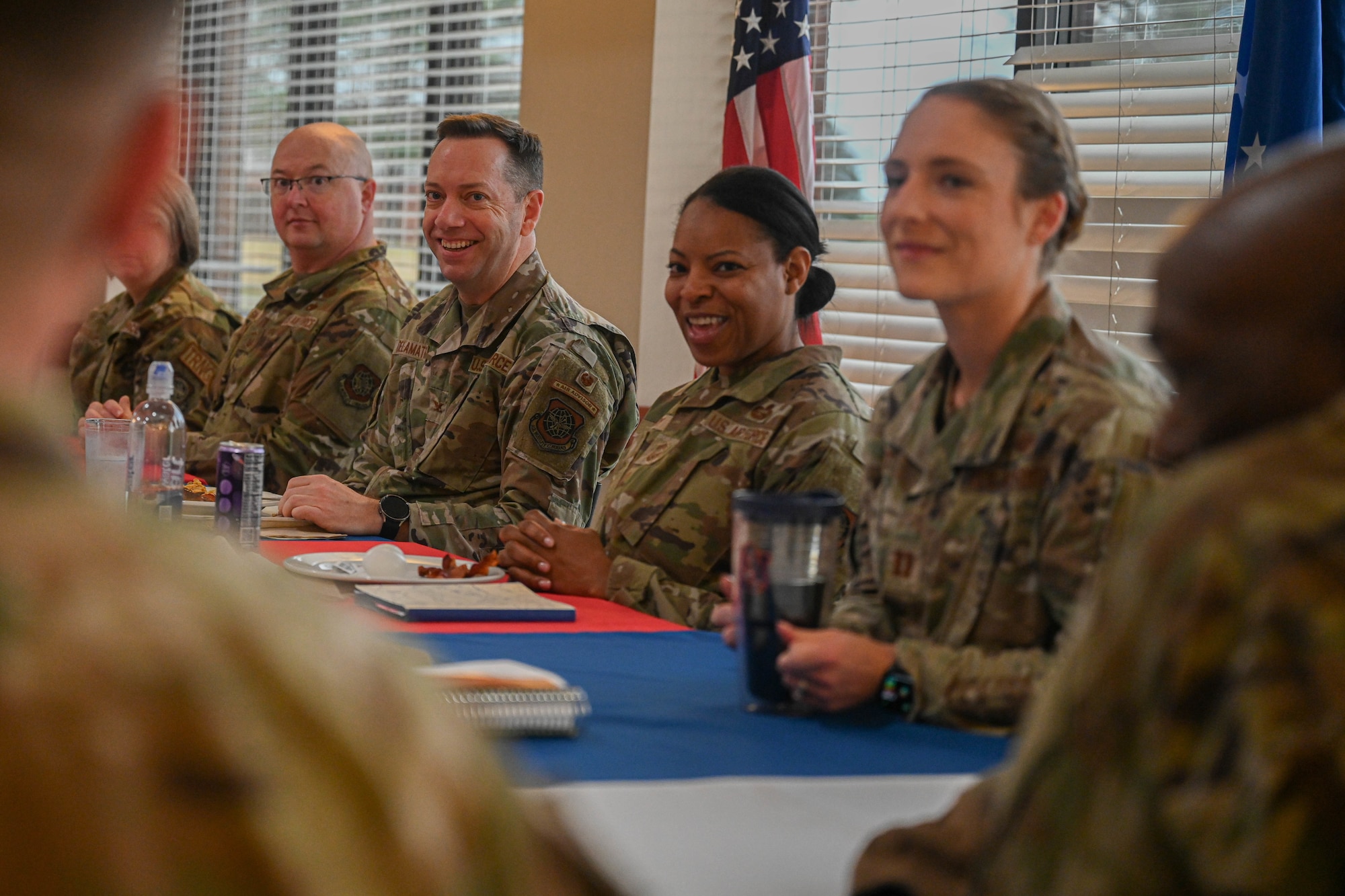 People sit at a table.