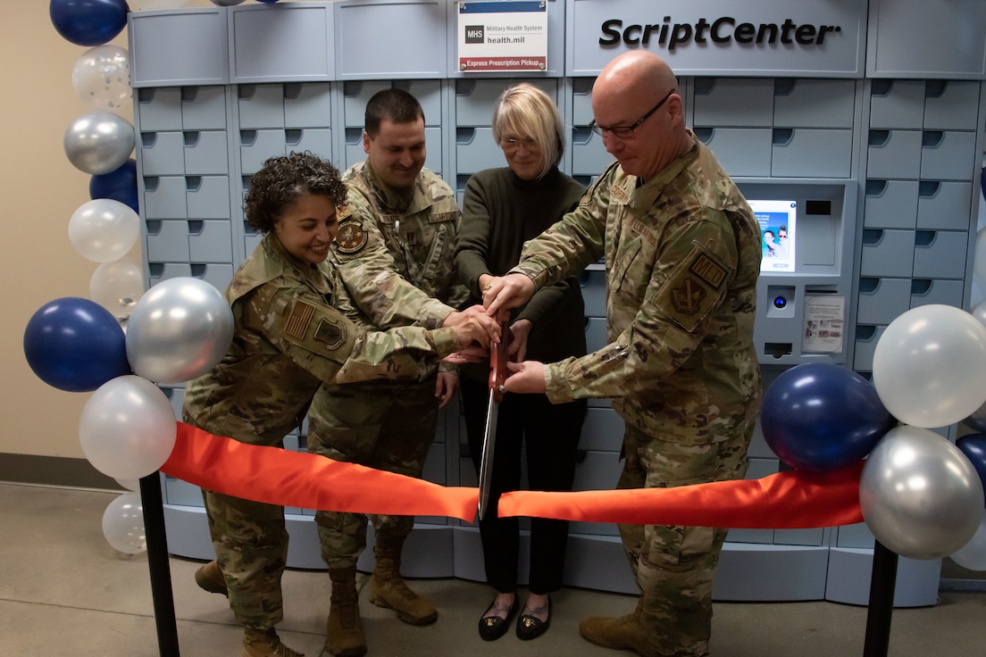 Members from the 316th Medical Group cut a ribbon during the launch of a new ScriptCenter at Joint Base Andrews, Md., March 11, 2024.