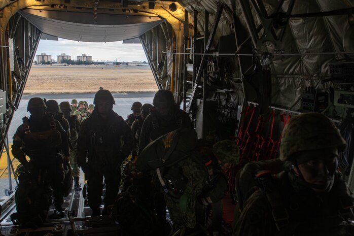 Paratroopers load onto a C-130J for static-line jump training during Airborne 24.