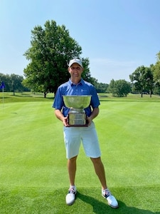 Jeff Scohy, Air Force Life Cycle Management Center acquisition program manager, poses for a photo with his trophy after winning the 114th Tony Blom Metropolitan Amateur Championship in Cincinnati, Ohio, June 24, 2024. The tournament was part of a Greater Cincinnati Golf Association event. (Courtesy Photo)