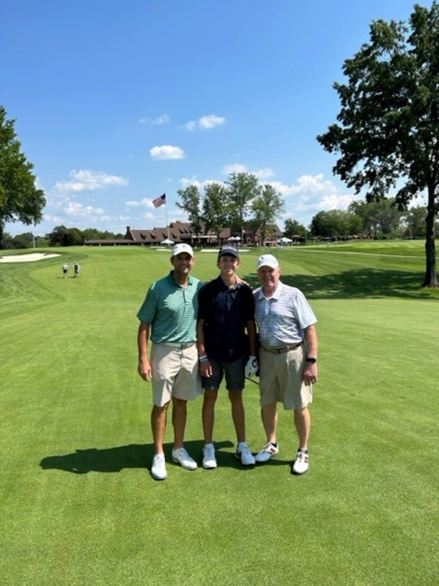 Jeff Scohy, Air Force Life Cycle Management Center acquistion program manager (left), poses for a photo with his son, CJ Scohy, and his dad, Bruce Scohy, at the Canterbury Golf Club near Cleveland, Ohio, July, 10, 2023. Scohy and his son qualified for a tournament got to participate in it together for the first time. (Courtesy Photo)
