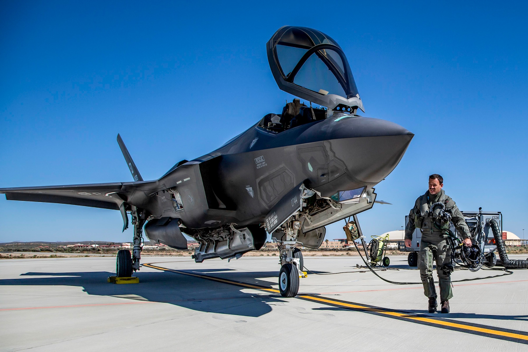 Lt. Col. Jonathan Bearce, an F-35 test pilot with the 370th Flight Test Squadron, conducts a walk-around of an F-35 Lightning II at Edwards Air Force Base, Califonia, April 2, 2020. (Photo courtesy of Darin Russell, Lockheed Martin)