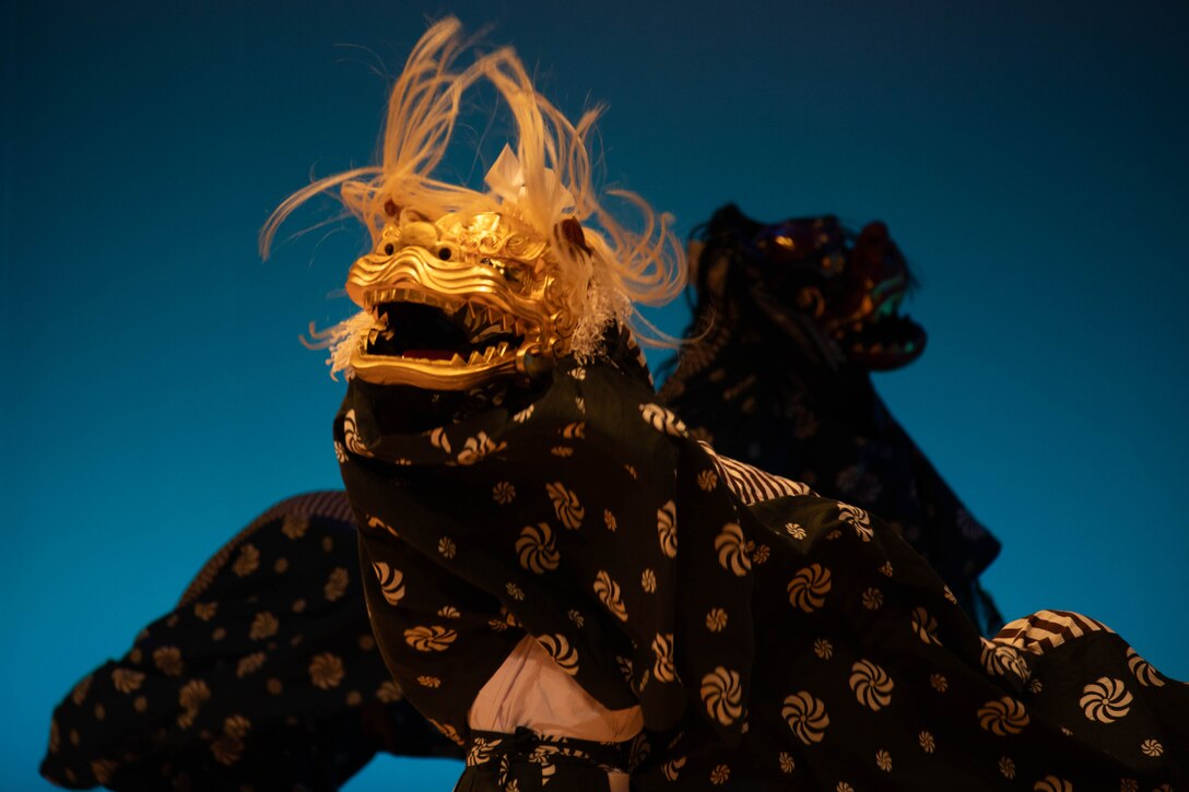 Performers demonstrate a Shisi-Mai during a Japanese American Society Culture Festival at the Iwakuni City Culture Hall in Iwakuni, Japan, March 10, 2024. The culture festival provided Japanese residents and members of Marine Corps Air Station Iwakuni the opportunity to view various traditional Japanese ceremonies and strengthen the relationship between the two communities. (U.S. Marine Corps photo by Lance Cpl. Rylan Adcock)