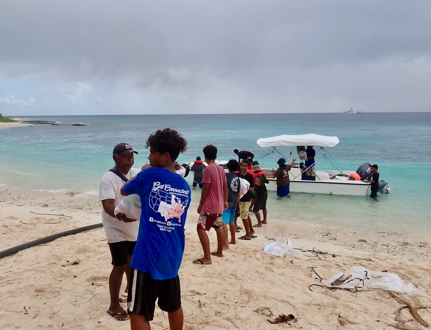 The crew of the USCGC Frederick Hatch (WPC 1143) deliver essential supplies, donated by the Ayuda Foundation and the Ulithi-based One People One Reef research foundation to Ulithi Atoll on Feb. 21, 2024. The crew completed a significant operational patrol under Operation Rematau from Feb. 15 to March 4, 2024, reinforcing the U.S. Coast Guard's commitment to maritime safety, security, and environmental stewardship in the Pacific region. (U.S. Coast Guard photo)