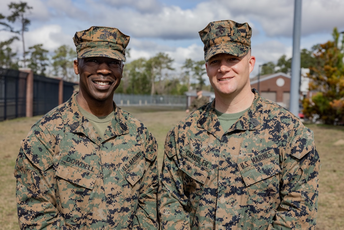 U.S. Marine Corps Master Gunnery Sgt. Eddie W. Dowdell III, left, outgoing sergeant major and Sgt. Maj. Casey S. Chandler, incoming sergeant major, both with 2nd Network Battalion, pose for a photo after a relief and appointment ceremony on Marine Corps Base Camp Lejeune, North Carolina, March 8, 2024. Dowdell relinquished his post as the senior enlisted advisor to Chandler. (U.S. Marine Corps photo by Lance Cpl. Alyssa J. Deputee)