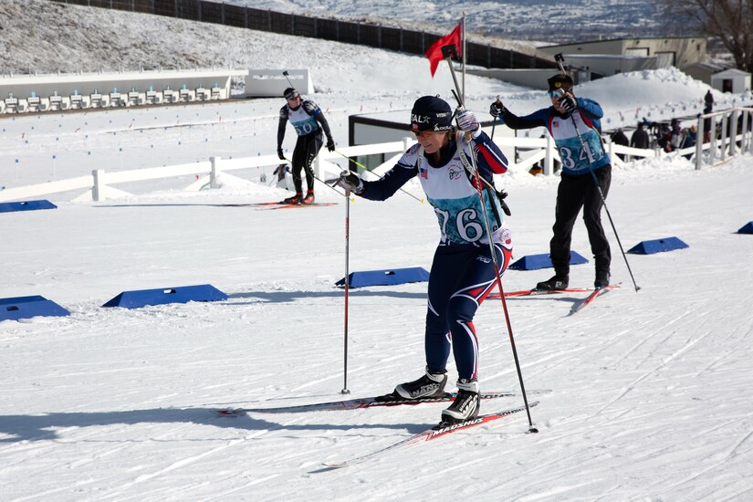 Brab Blanke, (retired) Utah National Guard, bib 76; Joshua Mauger, Pennsylvania National Guard, bib 34; and Theodore Ball, Wisconsin National Guard, bib 50 compete in the Sprint Race at the 50th anniversary Chief of the National Guard Bureau Biathlon Championships at Soldier Hollow Nordic Center, Feb. 17, 2024. The Utah National Guard hosted the national biathlon competition consisting of cross-country skiing and competitive shooting events that test the warriors’ endurance and marksmanship.