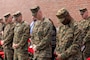 U.S. Marine Leaders with 2nd Network Battalion bow their heads during the invocation as a relief and appointment ceremony begins on Marine Corps Base Camp Lejeune, North Carolina, March 8, 2024.