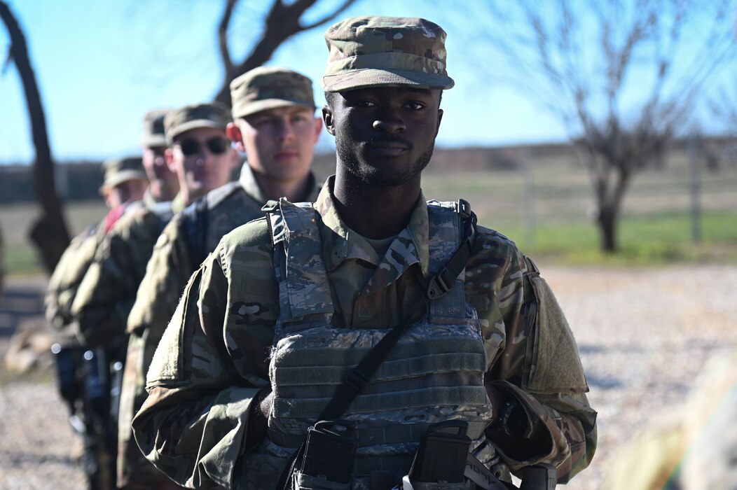Cadets from Angelo State University Air Force ROTC line up as part of a field training exercise at Goodfellow Air Force Base, Texas, March 1, 2024. The cadets were preparing to participate in scenarios designed to increase their decision-making skills under pressure. (U.S. Air Force photo by Airman James Salellas)