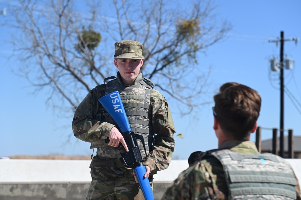 Cadet from Angelo State University Air Force ROTC awaits instructions as he participates in a tactical combat casualty care exercise as part of an annual field training exercise at Goodfellow Air Force Base, March 1, 2023. TCCC provides life-saving techniques to use on the battlefield. (U.S. Air Force photo by Airman James Salellas)