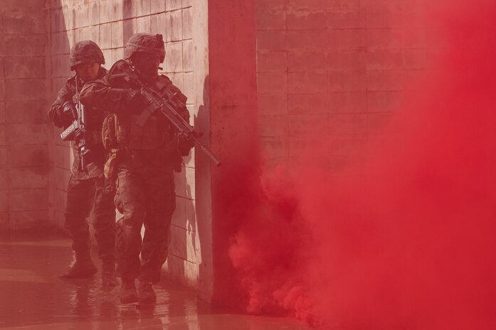 U.S. Marine Corps Lance Cpl. Ahmier Fillmore and a Republic of Korea Marine navigate in close-quarters during Korea Viper 24.1 at Camp Mujuk, Republic of Korea, Feb. 7, 2024. Urban operations training strengthens Marines' proficiency in navigating and engaging in urban terrain, ensuring readiness through realistic training of close-quarters combat scenarios. In its first iteration, Korea Viper demonstrates the ROK-US Marine Corps ability to respond decisively in the region as a singular, unified force while strengthening relationships and trust between the two allies. Fillmore, a native of New Jersey, is a rifleman 2d Battalion, 7th Marines. 2/7 is forward deployed in the Indo-Pacific under 4th Marine Regiment, 3d Marine Division as part of the Unit Deployment Program. (U.S. Marine Corps photo by Lance Cpl. Evelyn Doherty)