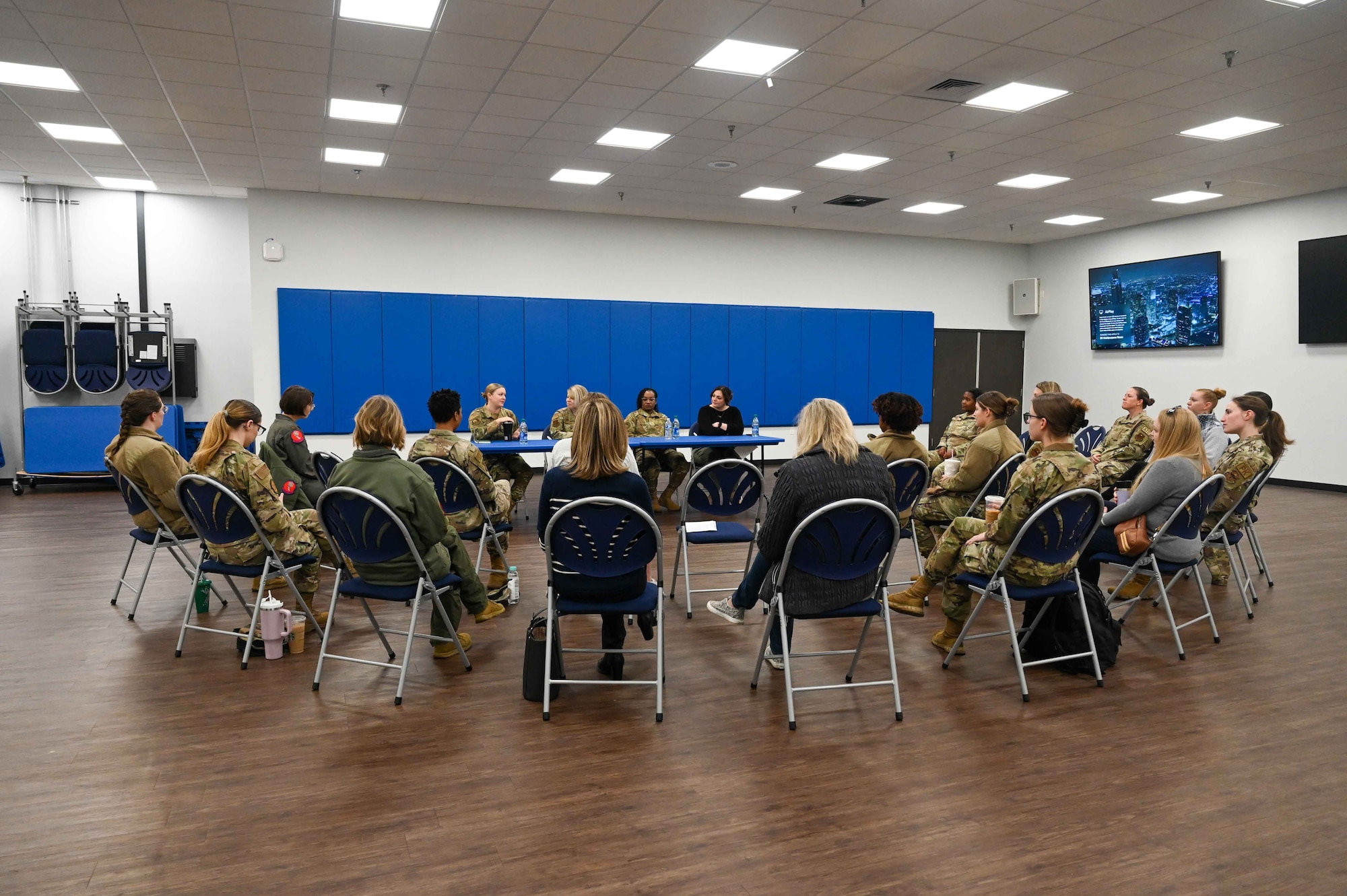 Women from around Altus Air Force Base, Oklahoma, meet in the Base Exchange multi-purpose room for Coffee and Connect, March 6, 2024. For Women's History Month, the organizers planned for a panel made up of enlisted, officer, and civilian women to speak about their experiences within the military. (U.S. Air Force photo by Airman 1st Class Kari Degraffenreed)