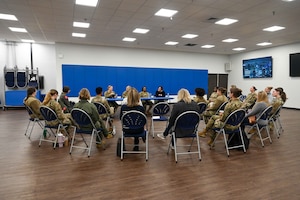 Women from around Altus Air Force Base, Oklahoma, meet in the Base Exchange multi-purpose room for Coffee and Connect, March 6, 2024. For Women's History Month, the organizers planned for a panel made up of enlisted, officer, and civilian women to speak about their experiences within the military. (U.S. Air Force photo by Airman 1st Class Kari Degraffenreed)