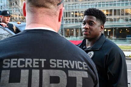 U.S. Army Capt. Ketner Jackson, deputy commander, 33rd WMD-CST, receives a briefing from a member of the U.S. Secret Service in Washington, D.C., March 1, 2024.  The 33rd WMD-CST was strategically positioned to respond effectively with D.C. Fire, U.S. Secret Service, U.S. Capitol Police, and CBRNE Enhanced Response Force Packages (CERFP) units.