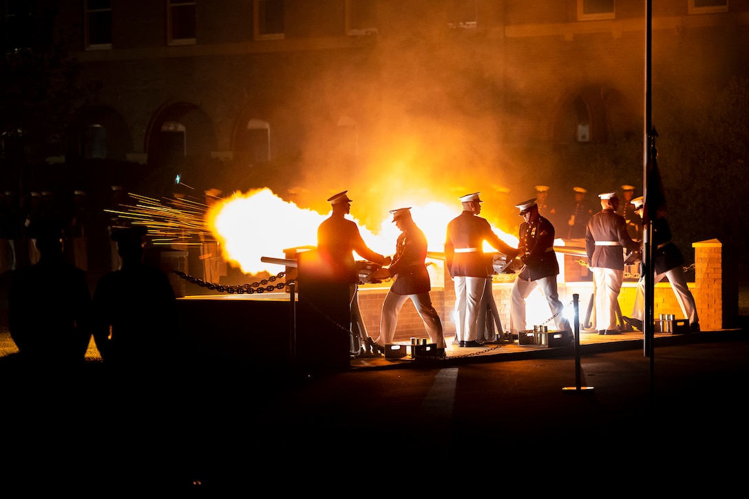 The United States Marine Corps Body Bearers fire canons during a Friday Evening Parade at Marine Barracks Washington D.C., May 12, 2023. The hosting official for the evening was Gen. Eric M. Smith, Assistant Commandant of the Marine Corps, and The Honorable Steve Scalise, House Majority Leader, was the guest of honor. (U.S. Marine Corps photo by Gunnery Sergeant Donell Bryant)