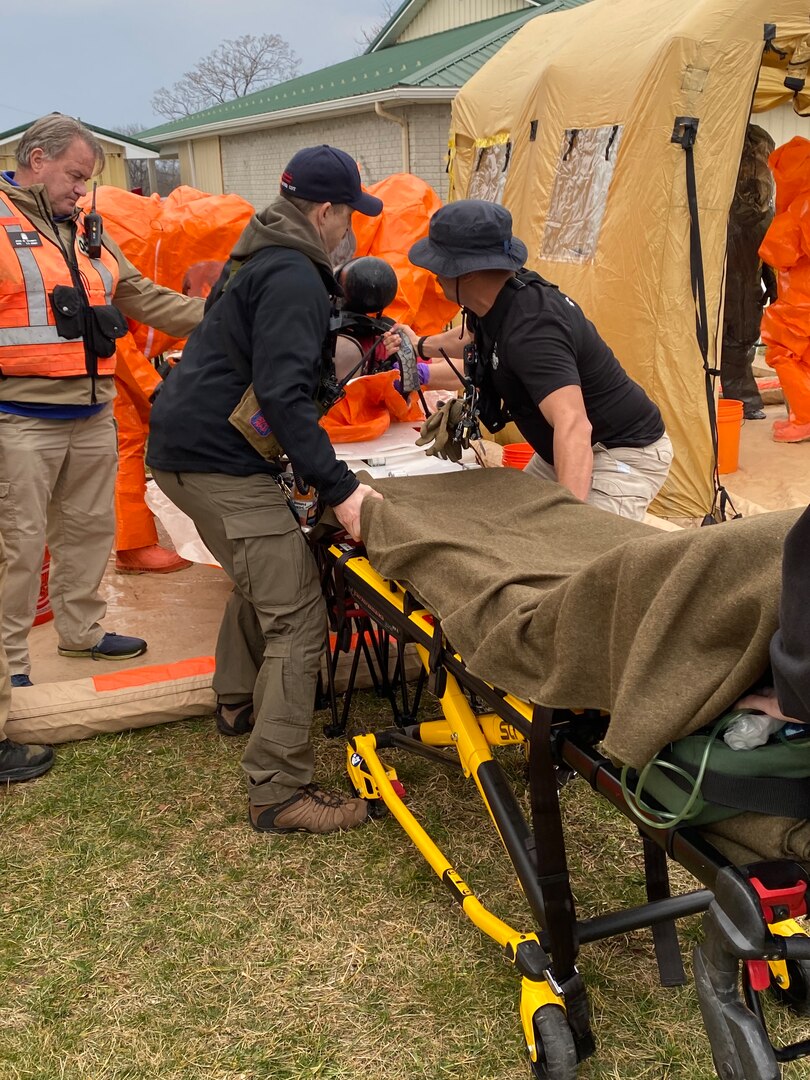 Members of the District of Columbia National Guard’s 33rd Weapons of Mass Destruction-Civil Support Team (WMD-CST) practice removing an injured teammate from a contamination zone during an Army North (ARNORTH) Collective Lanes Training, in Winchester, Va., Feb. 28-March 1, 2024.  The ARNORTH evaluation takes place every 18 months to ensure members are prepared to effectively respond to WMD incidents throughout the National Capital Region, the Continental United States, and its territories.