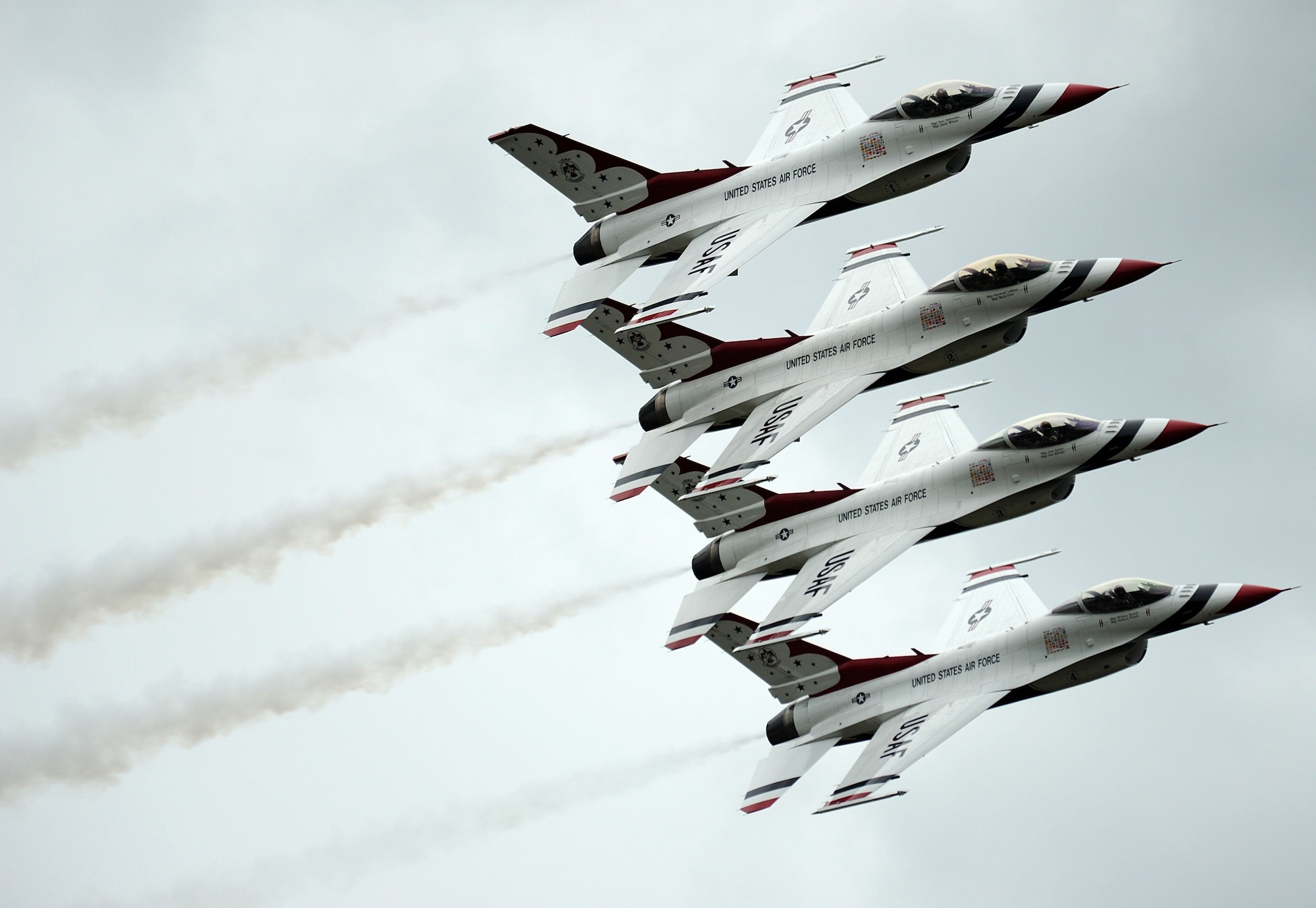 The U.S. Air Force Air Demonstration Squadron "Thunderbirds", perform the Echelon Pass and Review during the practice air show at Turku Airport, Turku, Finland, June 17, 2011.