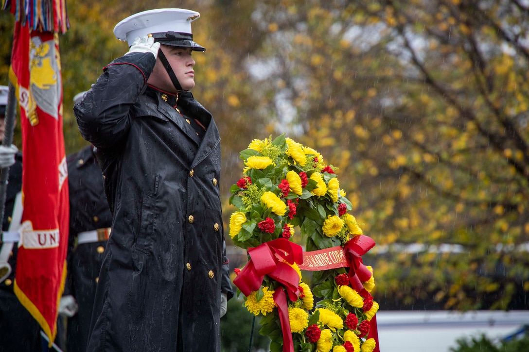 U.S. Marine Corps Lance Cpl. Hunter Pullium, a native of Parker, Colo., and Body Bearer,, Marine Barracks Washington, salutes during a Wreath Laying Ceremony at the Marine Corps War Memorial, Arlington, Va., Nov. 10, 2023. The hosting official was Lt. Gen. Gregg P. Olson, Director of Marine Corps Staff, and the guest of honor was the Honorable Carlos Del Toro, Secretary of the Navy. (U.S. Marine Corps photo by Lance Cpl. Chloe McAfee)