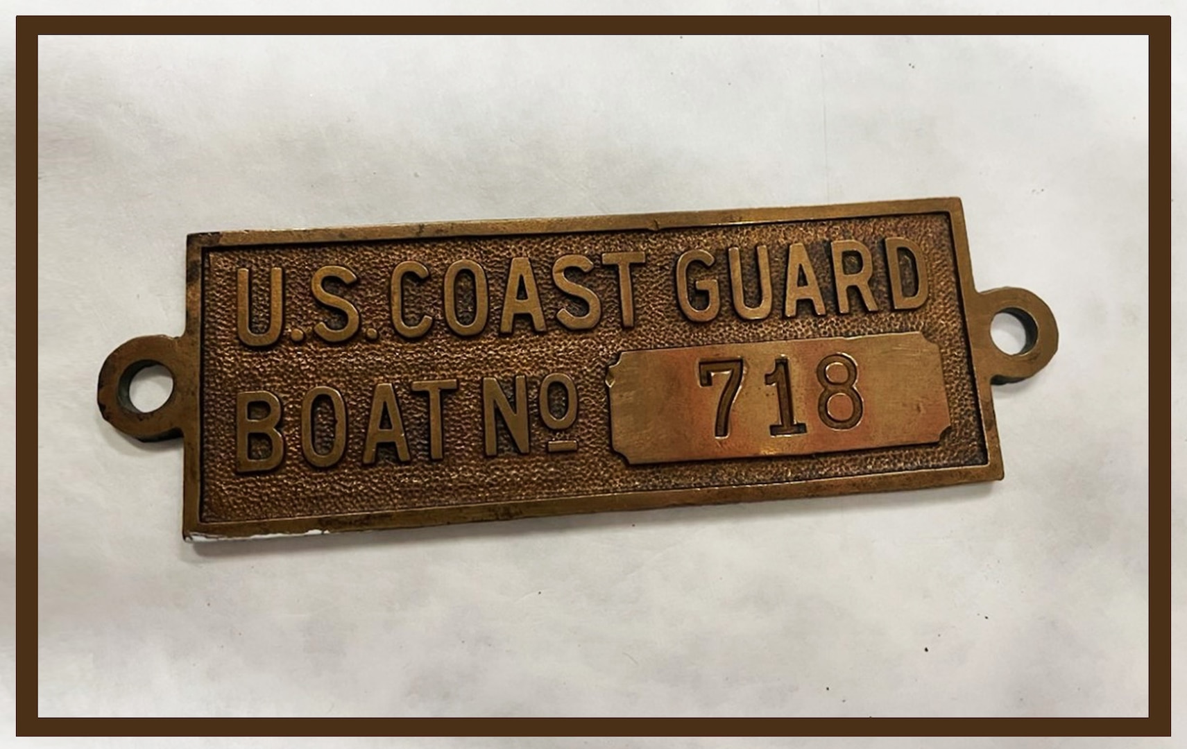 The bonze placard is the only verified artifact from the Coast Guard Cutter Tampa, which sank in September 1918 off the coast of Wales, just before the end of World War I.