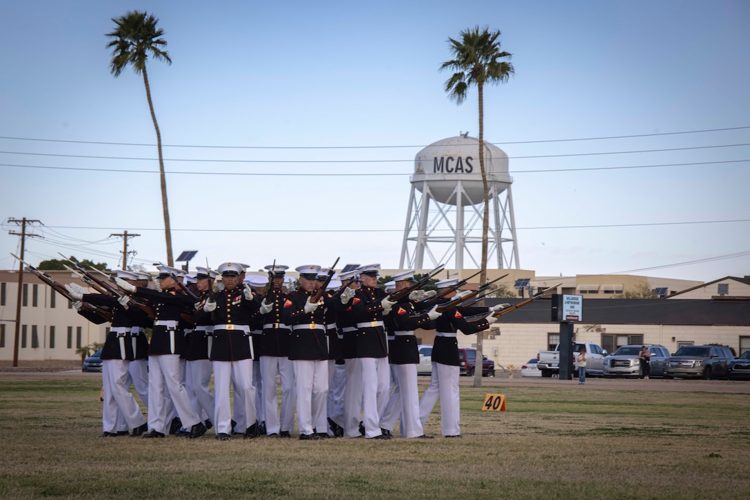 Marines with The Silent Drill Platoon, execute the “bursting bomb” sequence during a Battle Color Detachment ceremony at Marine Corps Air Station Yuma, Ariz., Feb. 28, 2024. The performance was the first of many performances along the west coast including Arizona, Nevada, and New Mexico. (U.S. Marine Corps photo by Lance Cpl. Chloe N. McAfee)