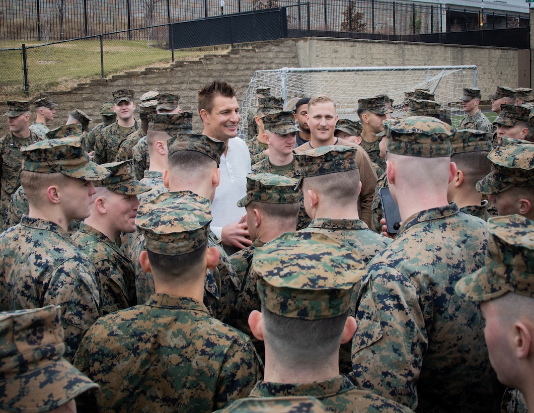 Robert Gronkowski, retired tight-end for the Tampa Bay Buccaneers, greets barracks Marines during a meet and greet session at Marine Barracks Washington on Jan 17, 2023. Gronkowski was introduced and given a tour of the barracks by Col. Robert A. Sucher, commanding officer of Marine Barracks Washington, and Sgt Maj. Jesse E. Dorsey, Sergeant Major of Marine Barracks Washington. (Photo by Lance Cpl. Pranav Ramakrishna)