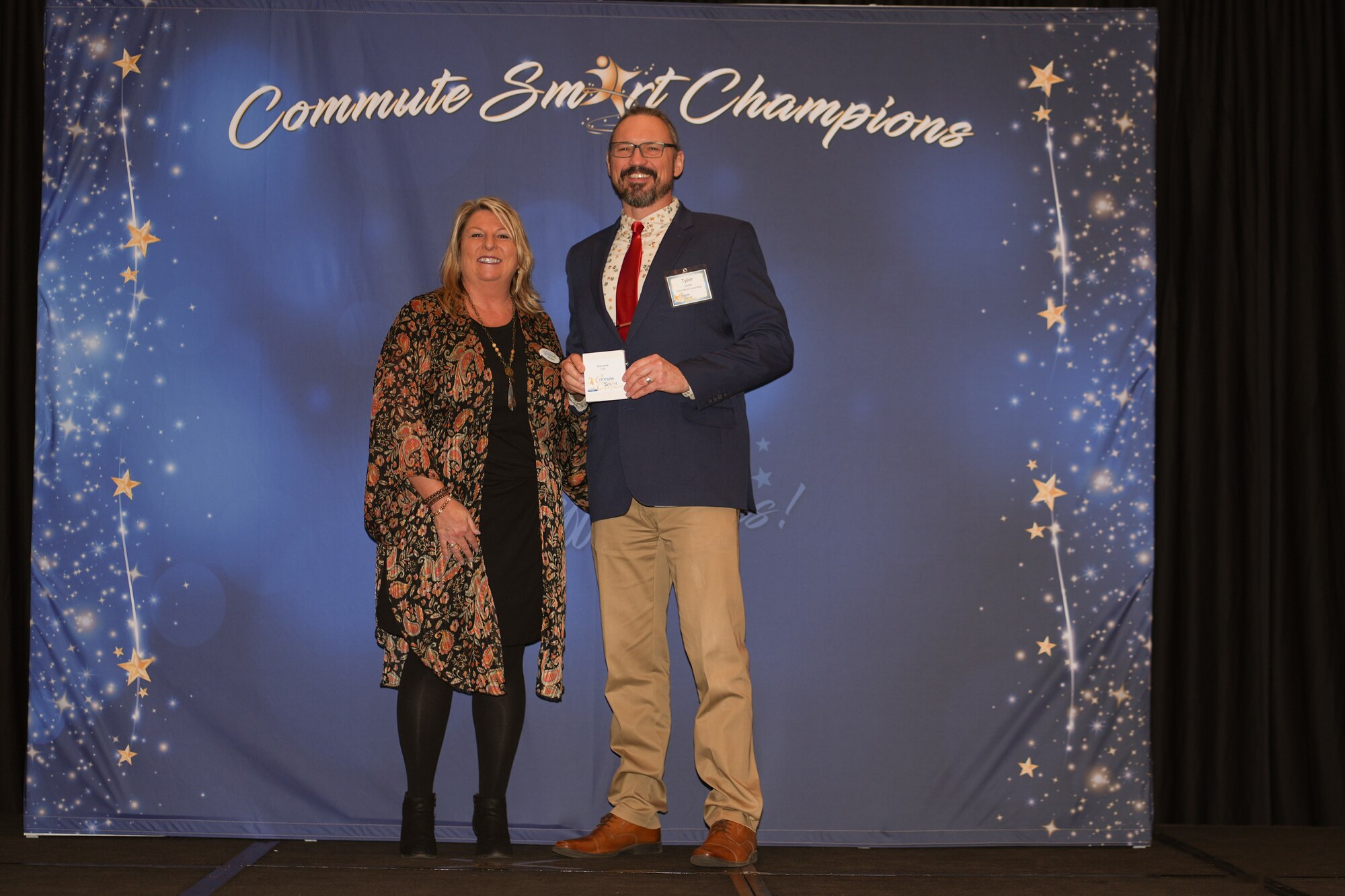 A man receives an award.