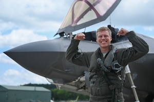 U.S. Air Force Maj. Joshua Hammervold, an F-35A Lightning II student instructor pilot with the 58th Fighter Squadron prepares to fly an F-35A for a training mission during exercise Northern Lightning at Volk Field Air National Guard Base, Wisconsin, Aug. 11, 2023.