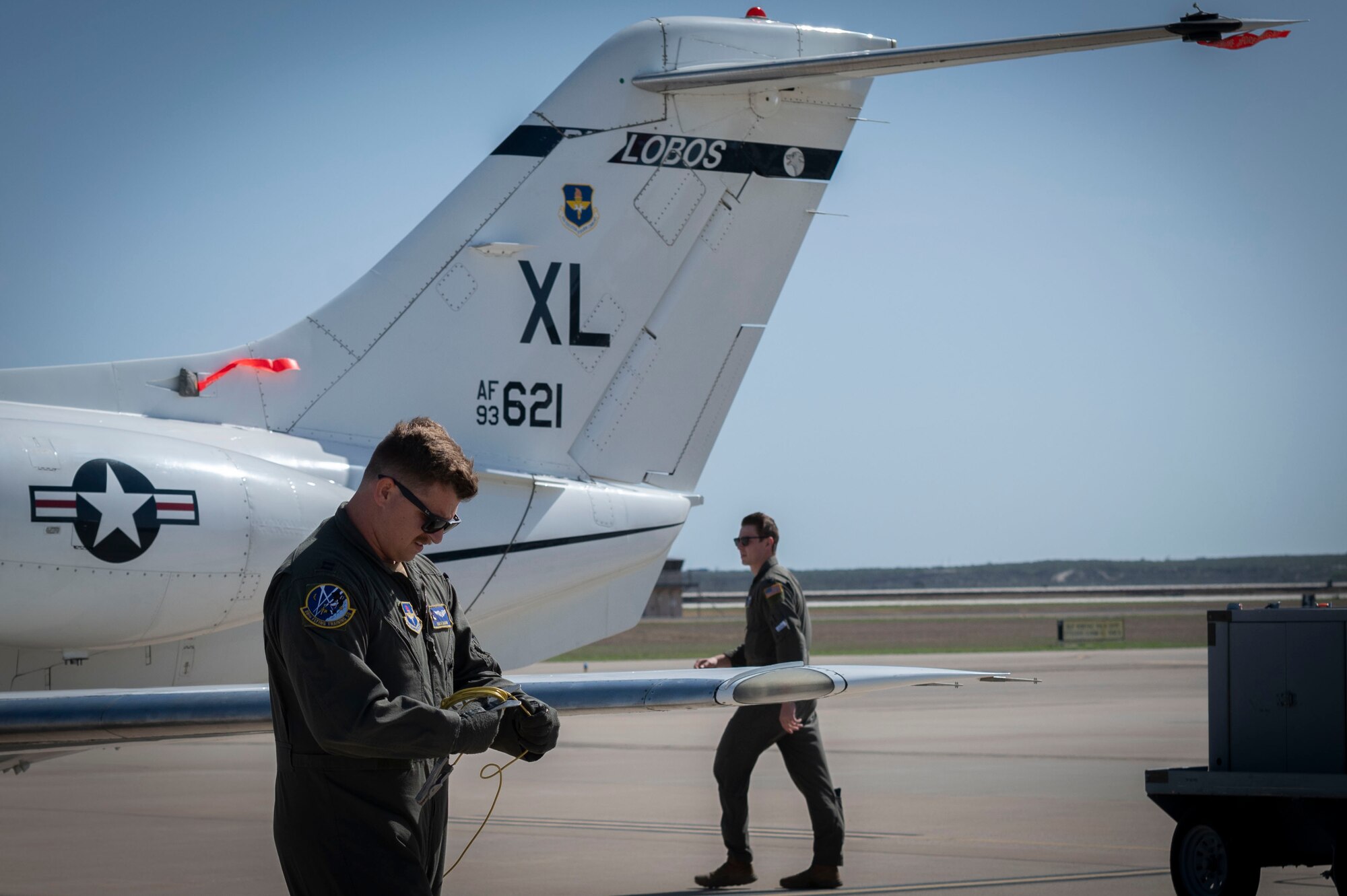 pilots performing a pre-flight inspection