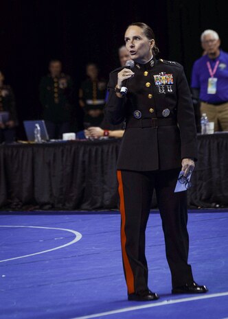 U.S. Marine Corps Major General Roberta L. Shea, Legislative Assistant to the Commandant of the Marine Corps, Office of Legislative Affairs, Headquarters Marine Corps, speaks at the National Collegiate Women’s Wrestling Championships, Cedar Rapids, IA., March 8, 2024. The National Collegiate Women’s Wrestling Championship works with the Wrestle Like A Girl to promote female empowerment through the sport of wrestling.  (U.S. Marine Corps photo by Cpl. Collette Hagen)