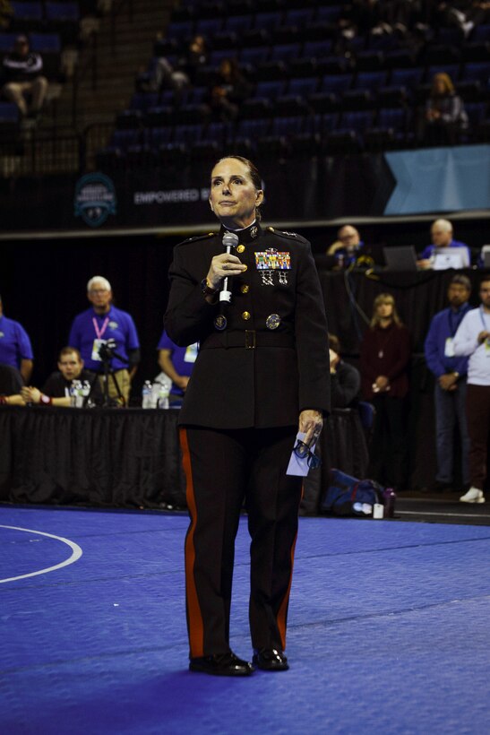 U.S. Marine Corps Major General Roberta L. Shea, Legislative Assistant to the Commandant of the Marine Corps, Office of Legislative Affairs, Headquarters Marine Corps, speaks at the National Collegiate Women’s Wrestling Championships, Cedar Rapids, IA., March 8, 2024. The National Collegiate Women’s Wrestling Championship works with the Wrestle Like A Girl to promote female empowerment through the sport of wrestling.  (U.S. Marine Corps photo by Cpl. Collette Hagen)