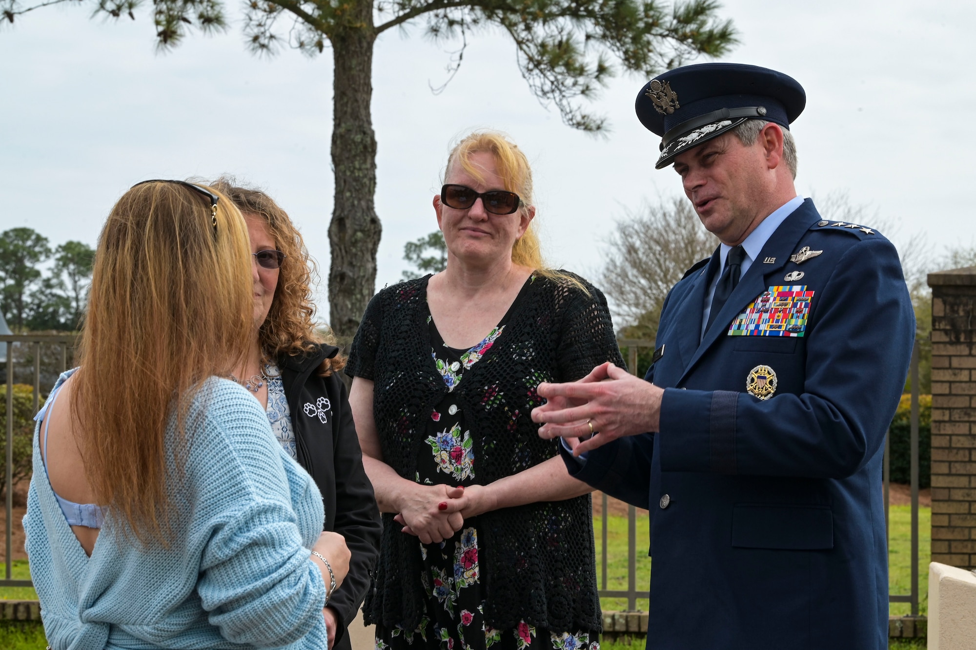 U.S. Air Force Lt. Gen. Michael Plehn, President of the National Defense University, speaks with family and friends of the Jockey-14 crew during the Jockey-14 Remembrance Ceremony at Hurlburt Field, Florida, Mar. 14, 2024. The ceremony was held as a reminder of those lost during the Jockey-14 crash, their sacrifices and their families’ enduring sacrifice. (U.S. Air Force photo by Senior Airman Ty Pilgrim)