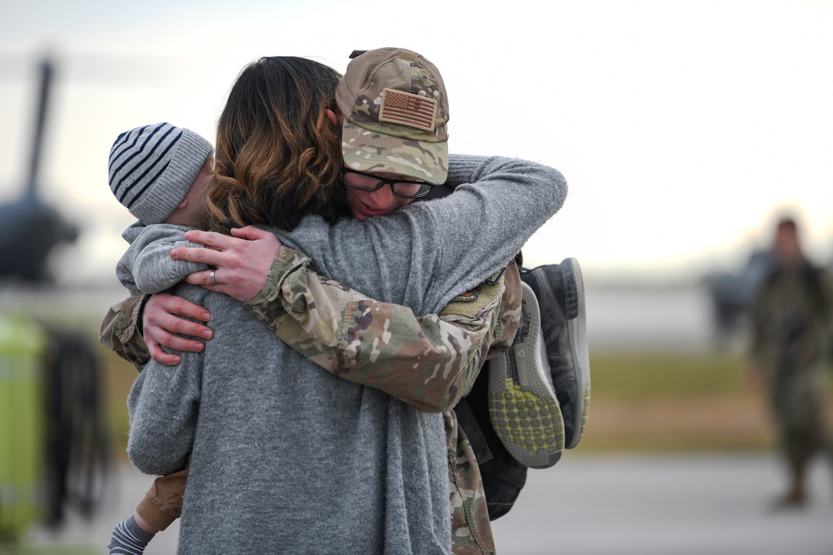 U.S Airmen reunites with family and receives a hug at Aviano Air Base, Italy, Oct. 8, 2019. The HH-60G is also tasked to perform military operations other than war, including civil search and rescue, medical evacuation, disaster response, humanitarian assistance, security cooperation/aviation advisory, NASA space flight support, and rescue command and control. (U.S. Air Force photo by Airman 1st Class Ericka A. Woolever).
