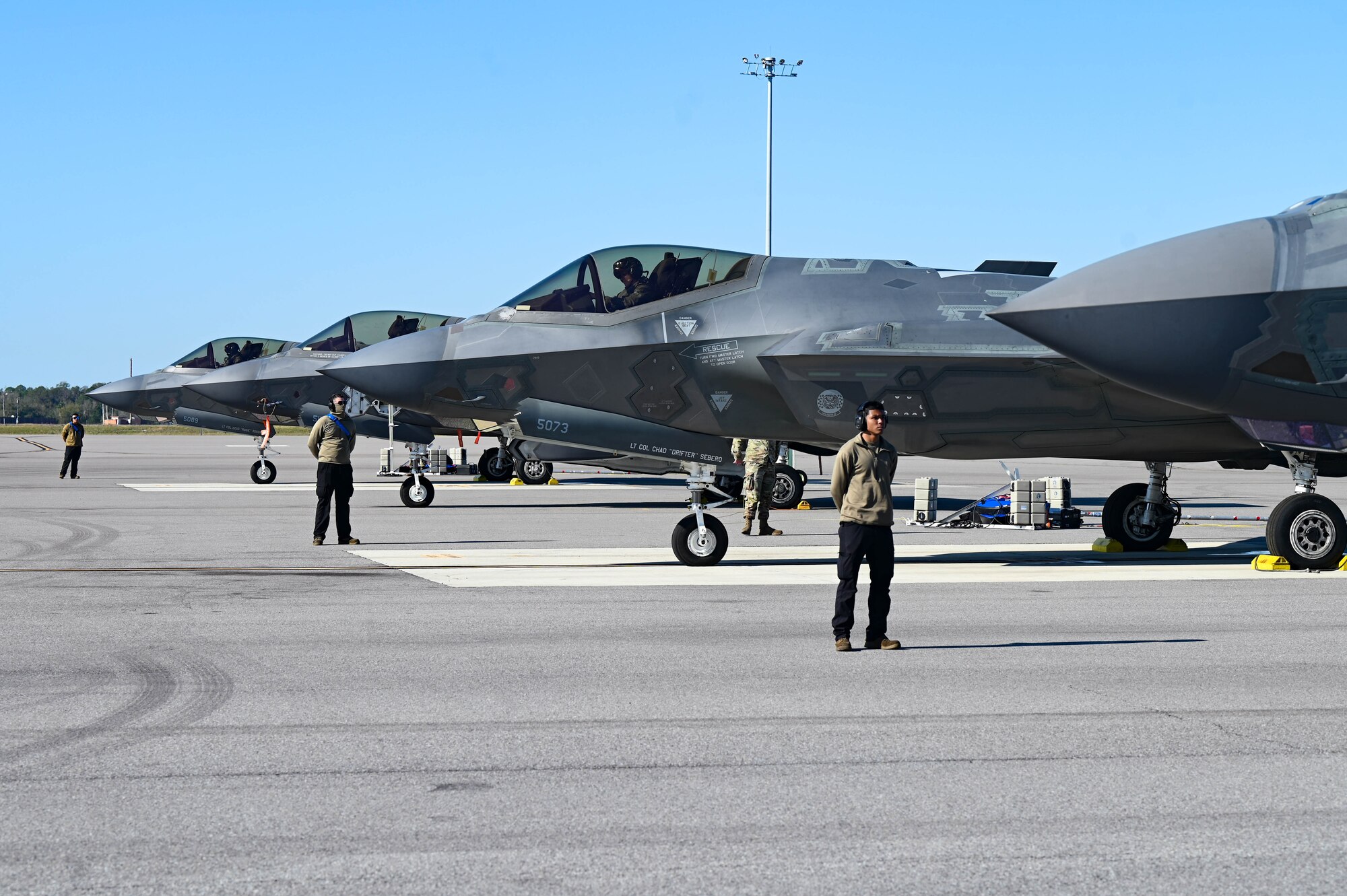 A photo of a row of F-35s.