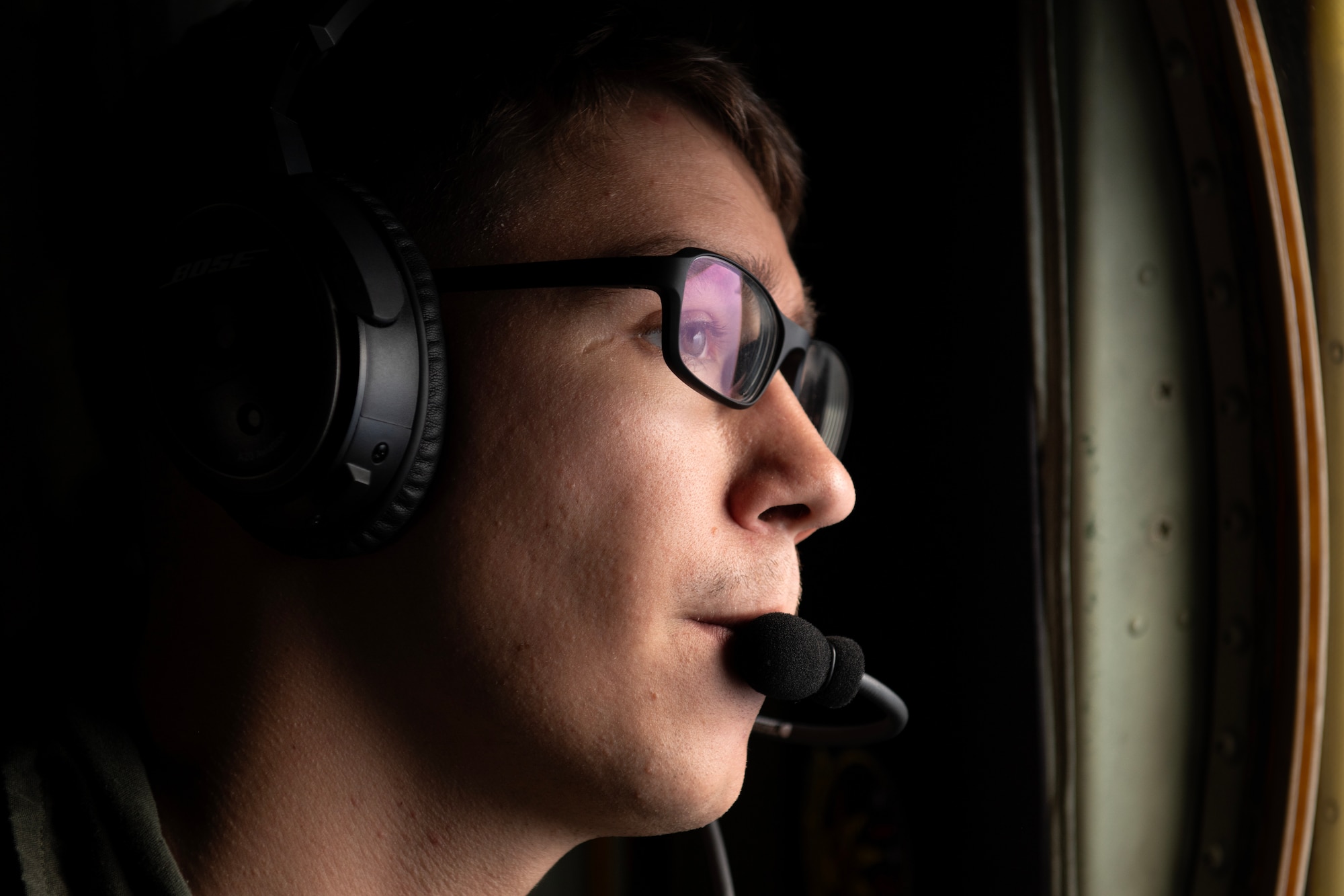 U.S. Marine Corps Lance Cpl. Joseph Sleinsky, a loadmaster with Marine Aerial Refueler Transport Squadron (VMGR) 152, monitors helicopter air-to-air refueling during a joint search and rescue training mission over the Pacific Ocean, March 13, 2024. HAAR operations act as a force extender, keeping rescue assets in the air longer. (U.S. Air Force Photo by Staff Sgt. Jessi Roth)