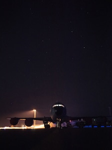 A KC-135 photographed at night