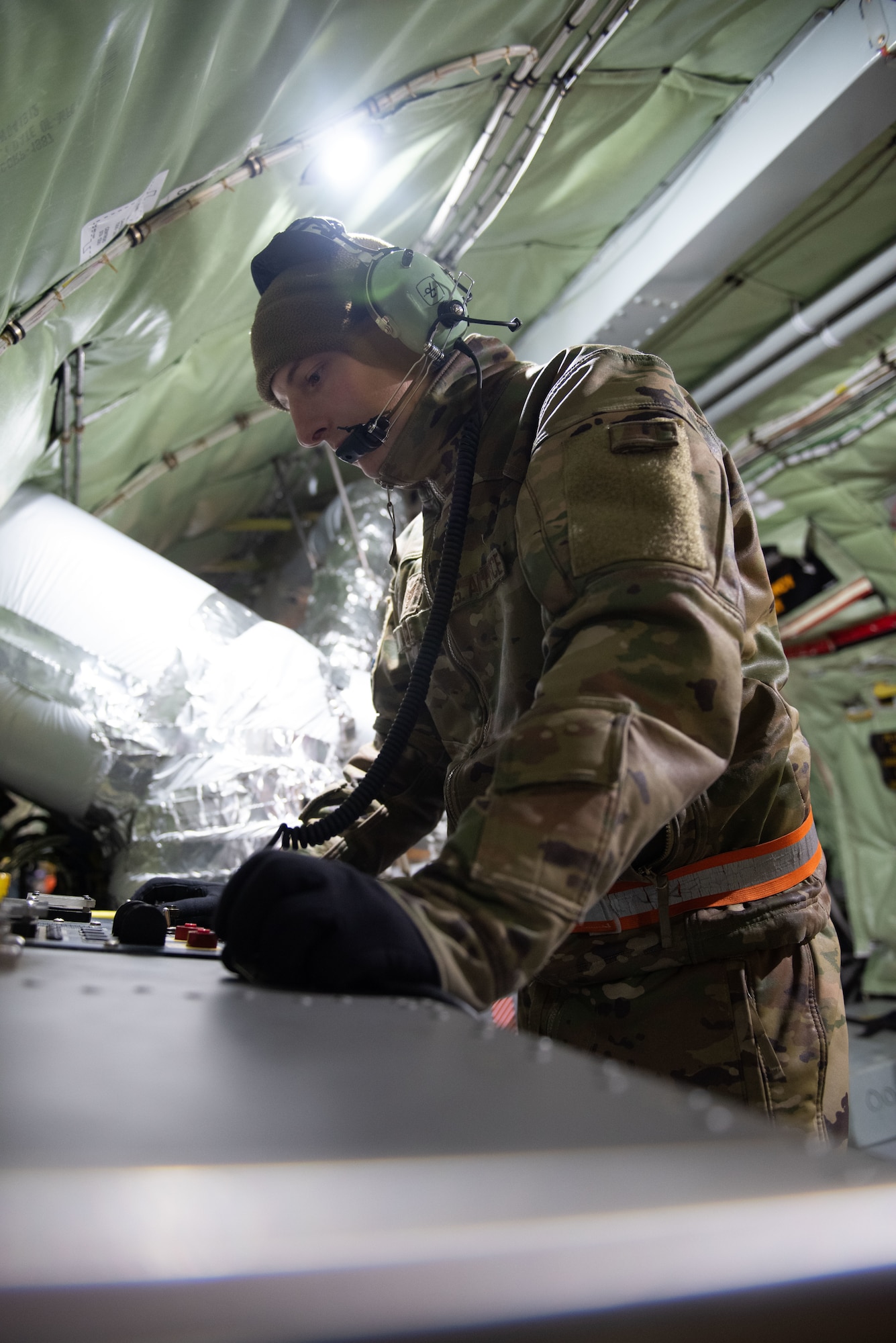 Airman works inside tanker in Sweden